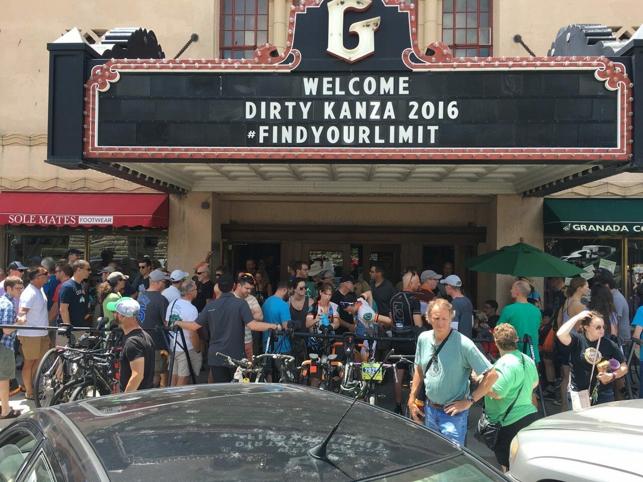 Old theater entrance canopy with sign that reads Welcome Dirty Kanza 2016 #FINDYOURLIMIT