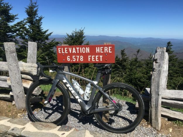 Bike Trek Madone 9 leaning at the top of a mountain at 6,578 feet