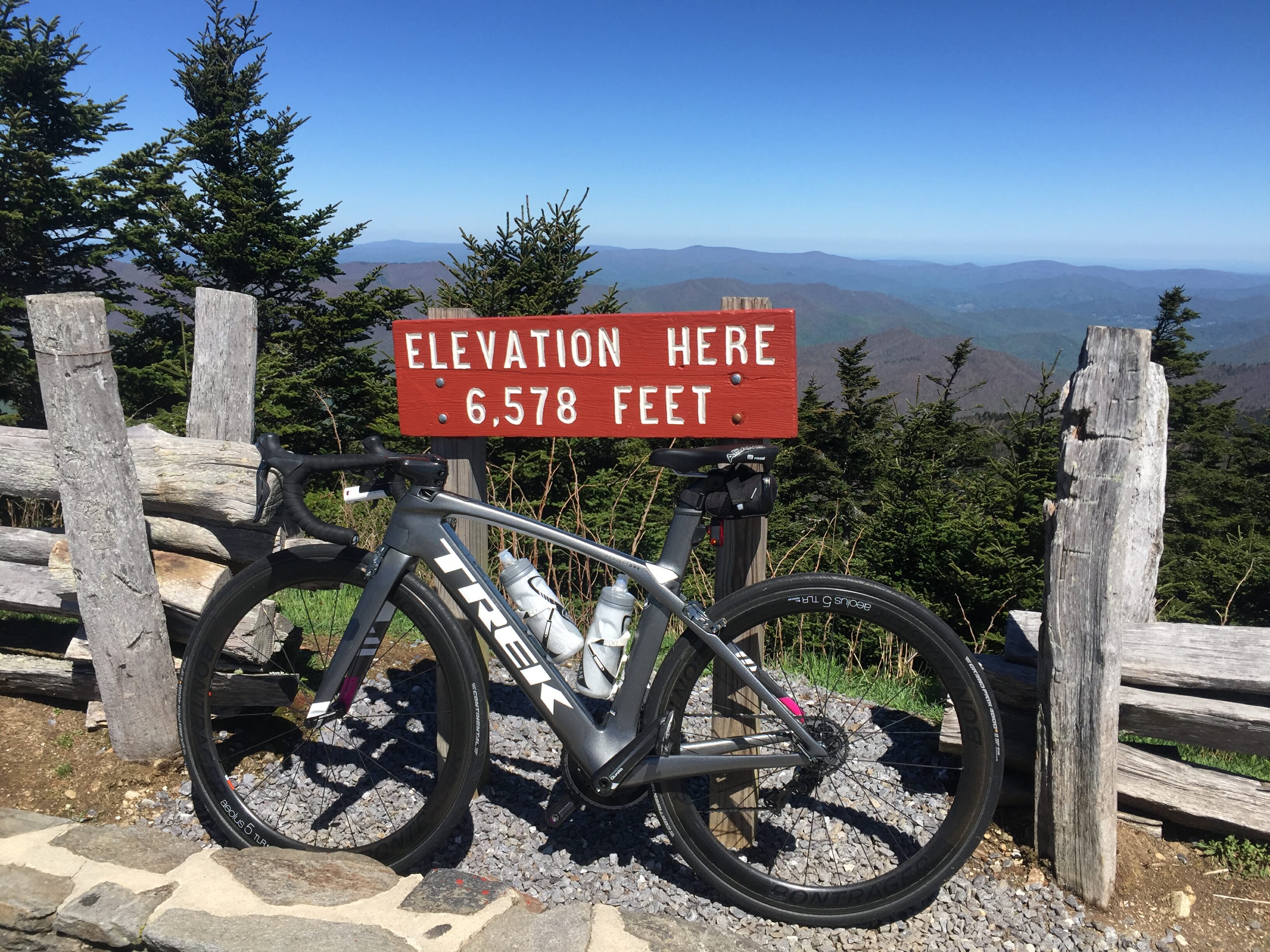 Bike Trek Madone 9 leaning at the top of a mountain at 6,578 feet